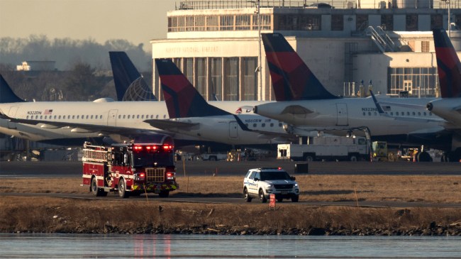 Emergency crews American Airlines passenger jet collided with Army Black Hawk helicopter