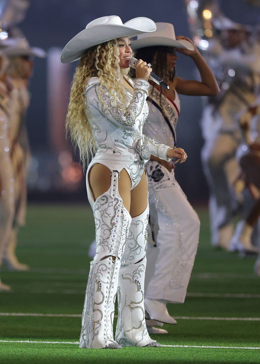 HOUSTON, TEXAS - DECEMBER 25: BeyoncÃ© performs with daughter, Blue Ivy, during the halftime show for the game between the Baltimore Ravens and the Houston Texans at NRG Stadium on December 25, 2024 in Houston, Texas. (Photo by Alex Slitz/Getty Images)