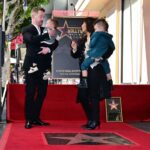 Macaulay Culkin, his partner Brenda Song and their children stand near his newly unveiled Hollywood Walk of Fame Star on December 1, 2023 in Hollywood.