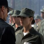 Demi Moore is stared down in a scene from the film "G.I. Jane," 1997. "With ‘Striptease,’ it was as if I had betrayed women, and with 'G.I. Jane,' it was as if I had betrayed men,” she said in an interview.