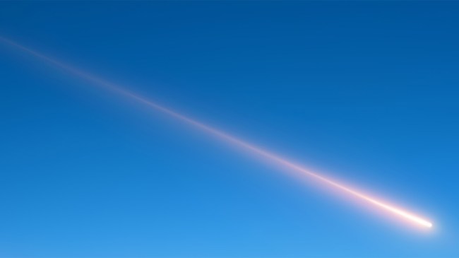 shooting star meteorite trail in a clear blue sky