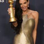 Demi Moore with her Best Actress Golden Globe