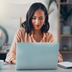 Woman working on laptop