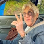 jay leno facial injuries peace sign