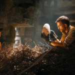 Zora Bennett and Dr. Henry Loomis with a dinosaur egg in Jurassic World Rebirth