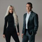 Kim Kardashian poses with SKKY Partners co-founder Jay Sammons