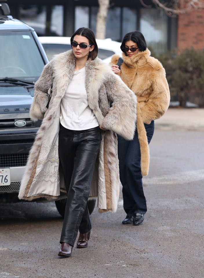 Kylie and Kendall Jenner wearing fur coats in Aspen.