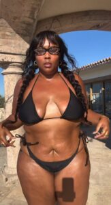 Lizzo stripped off to her bikini in a brand new post