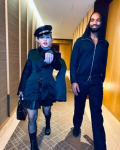 Madonna flashed a ring on her finger as she enjoyed a romantic break with Akeem Morris