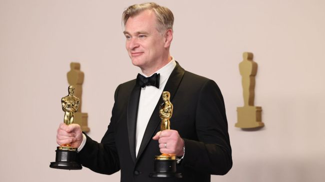 christopher nolan holding academy awards