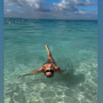 Olivia Ponton swimming in the sea.