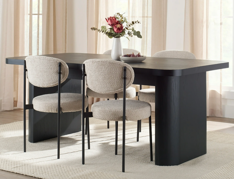 Walmart black dining table set up in a room