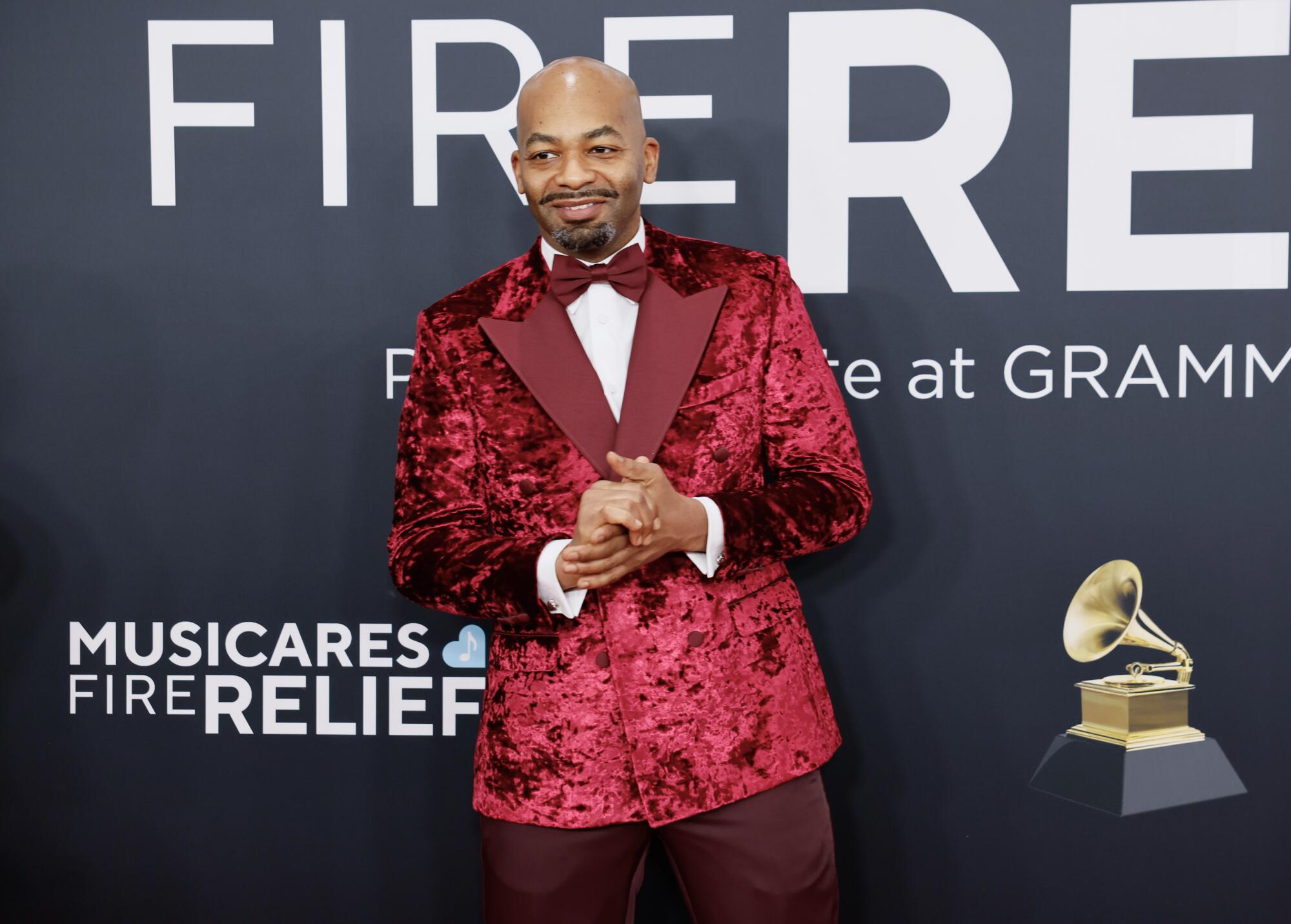 Brandon Victor Dixon opted for a textured jacket that matched the red carpet. (Allen J. Schaben / Los Angeles Times)