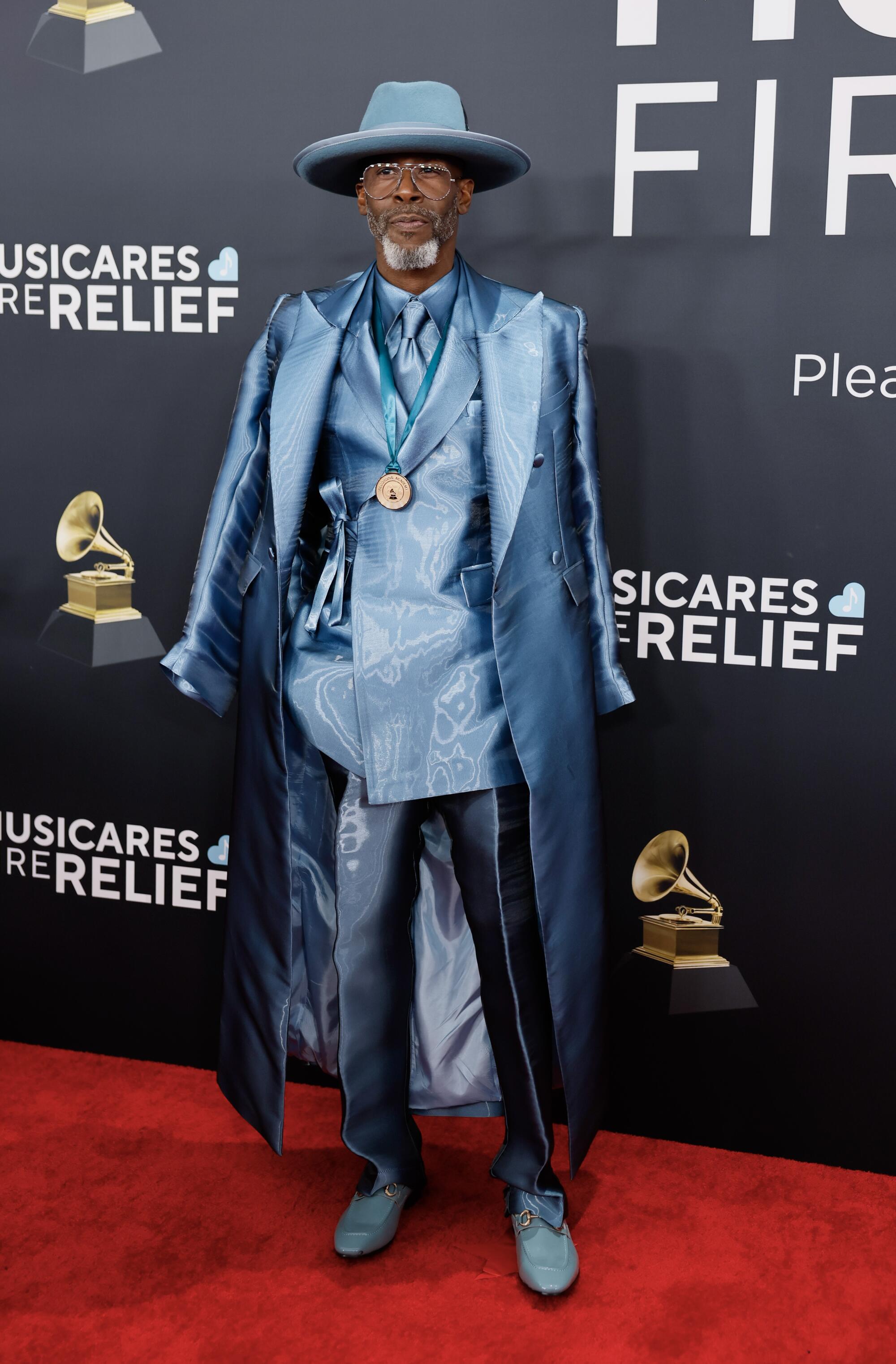 Ricky Dillard is blue all over on the red carpet (Allen J. Schaben / Los Angeles Times)