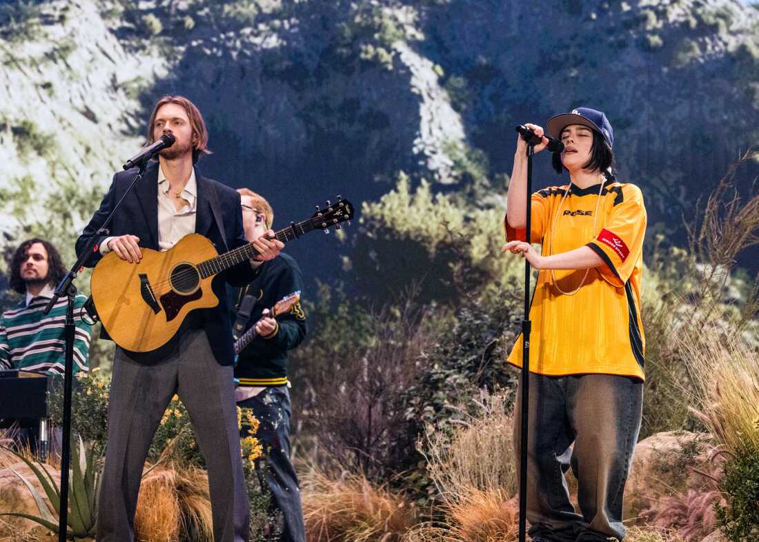 Finneas and Billie Eilish perform onstage during the 67th Annual GRAMMY Awards.