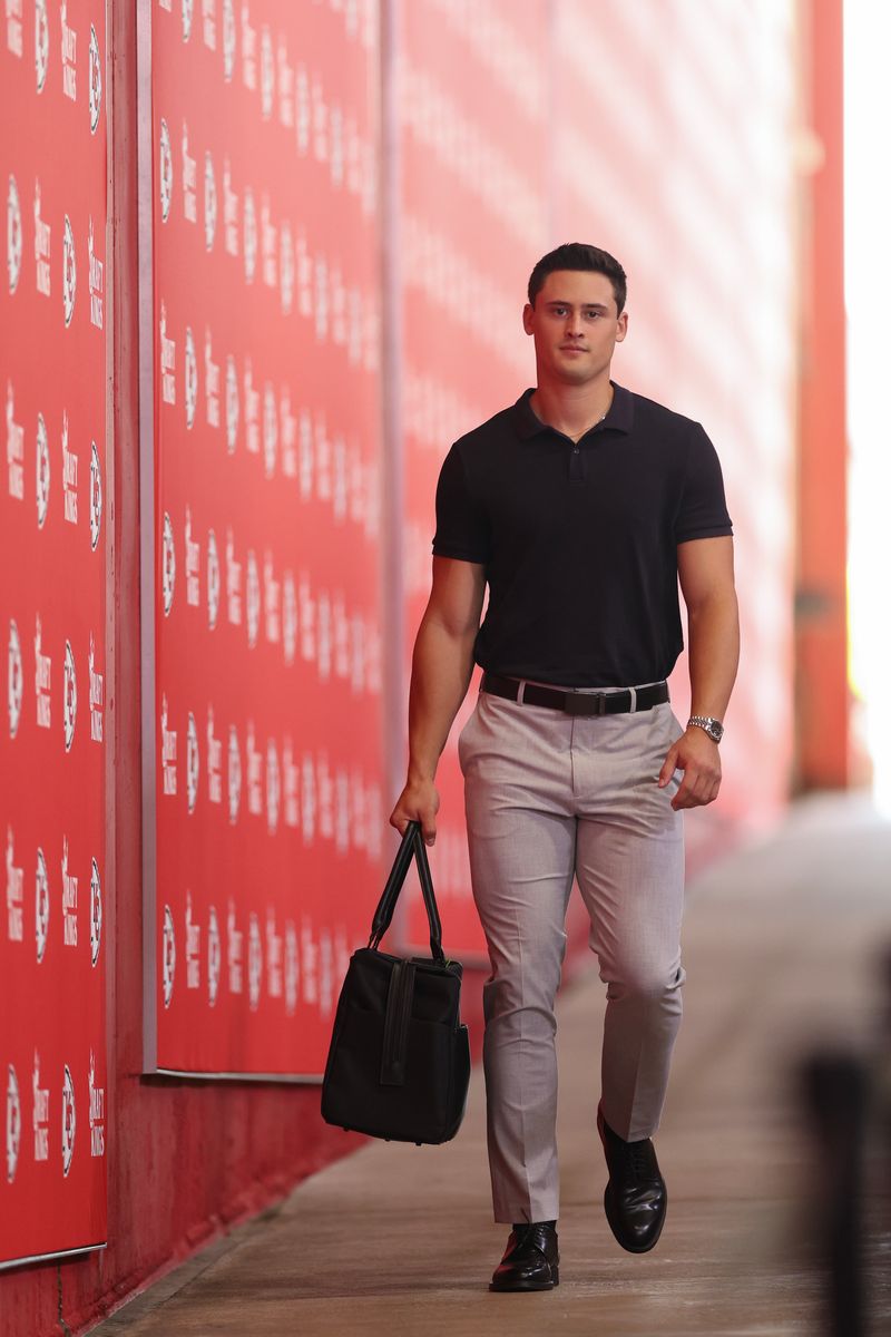 KANSAS CITY, MISSOURI - SEPTEMBER 15: Matt Araiza #14 of the Kansas City Chiefs arrives prior to the game against the Cincinnati Bengals at GEHA Field at Arrowhead Stadium on September 15, 2024 in Kansas City, Missouri. (Photo by Jamie Squire/Getty Images)