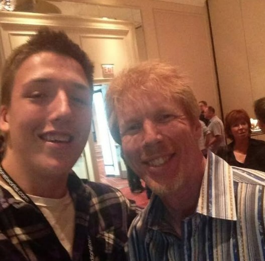 Two men posing for a selfie.