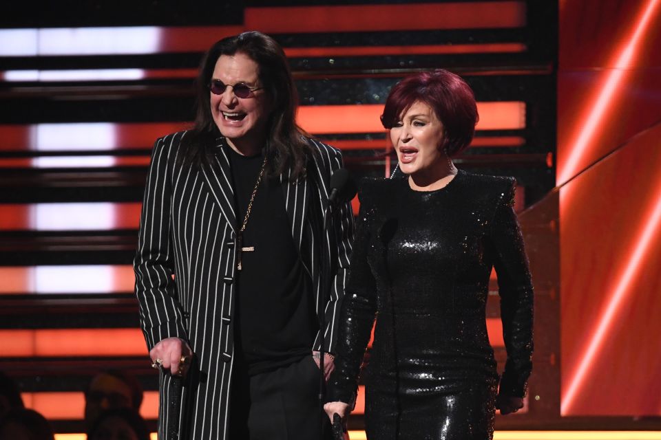 Ozzy and Sharon Osbourne presenting an award at the Grammy Awards.