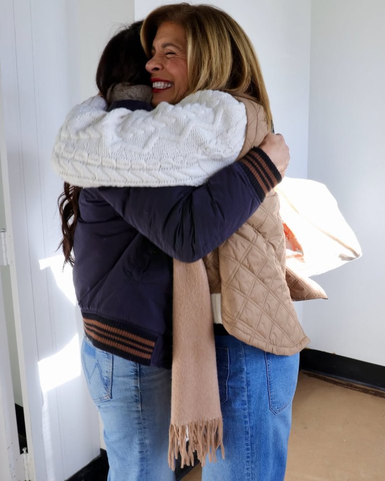 Two women embracing.