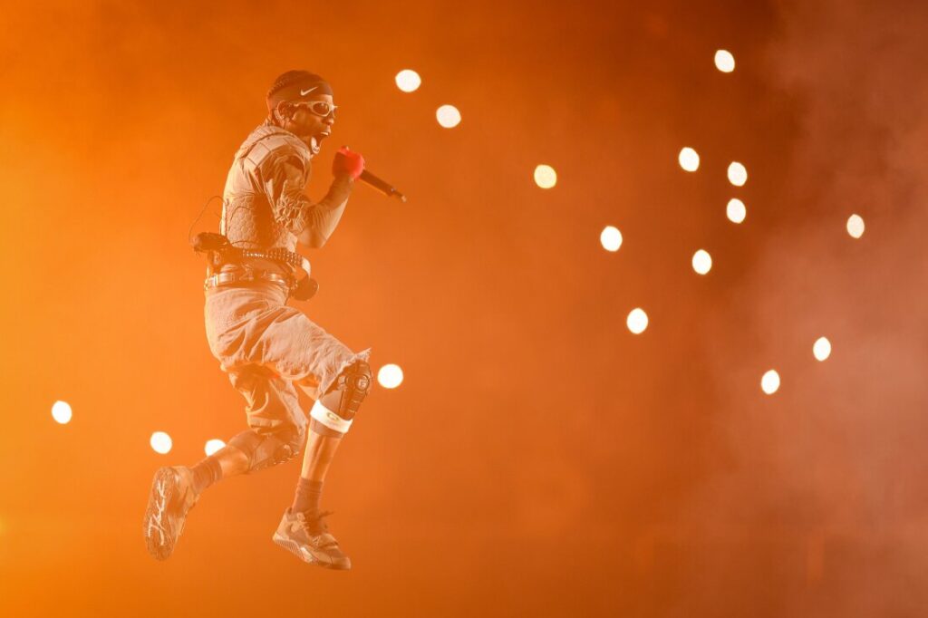 Travis Scott, seen here performing in the Netherlands in 2024, scored his fifth No. 1 pop hit this week with "4X4." Of those five hits, four topped Billboard's Hot 100 in their first week after being released.