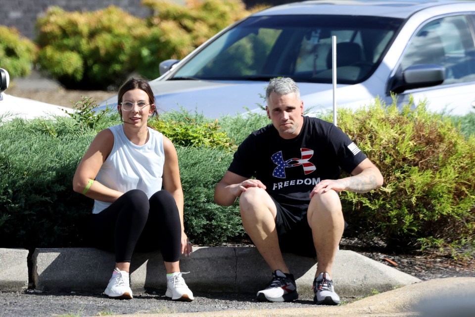 Ryan Edwards and Mackenzie Edwards sitting together outside a rehab facility.