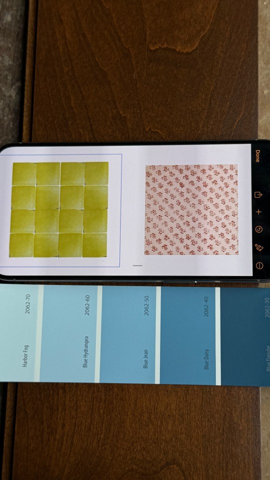 Phone screen showing tile samples, fabric swatch, and paint color swatches.