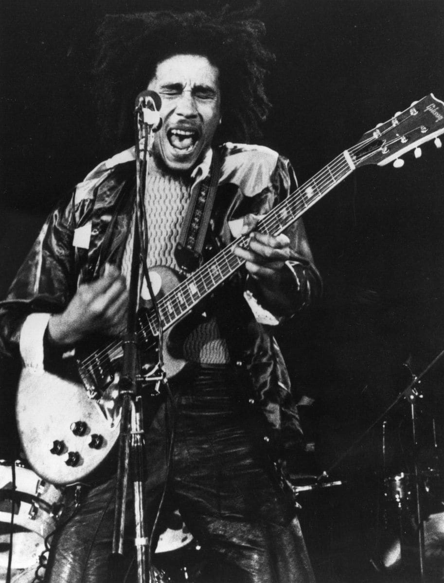 Reggae singer-songwriter Bob Marley (1945 - 1981),  in concert.   (Photo by Gary Merrin/Getty Images)