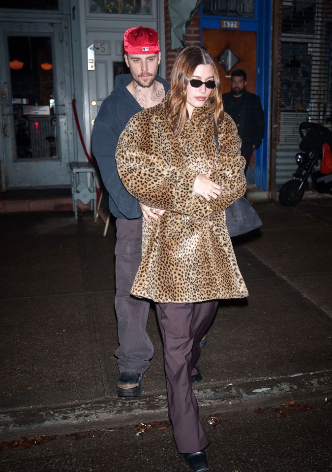 Justin Bieber and Hailey Bieber walking together in New York City.