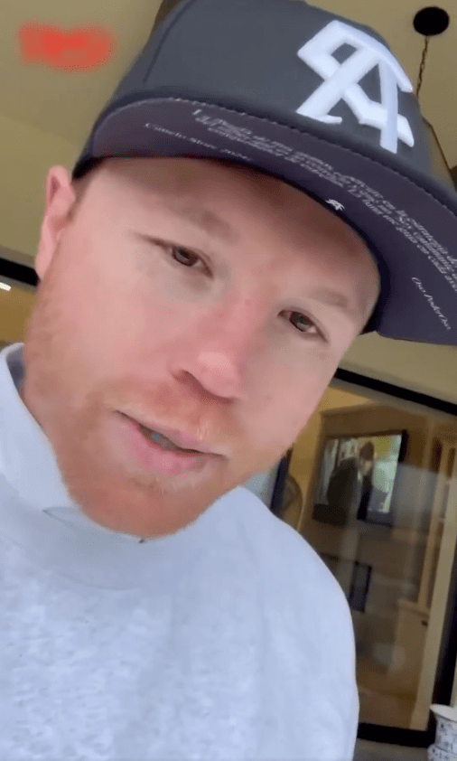 Close-up of a man wearing a baseball cap.