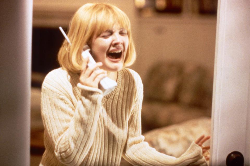 Drew Barrymore screaming on a phone in Scream.