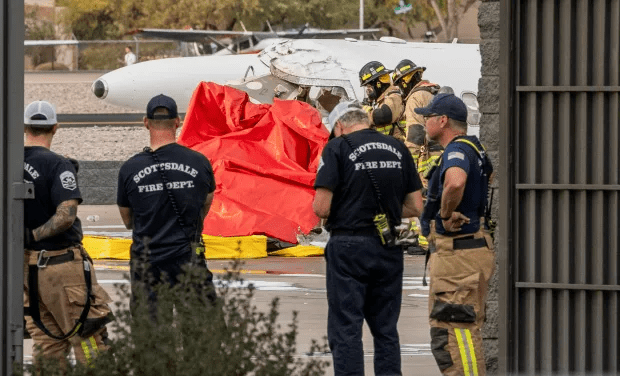 Firefighters at the scene of a plane crash.