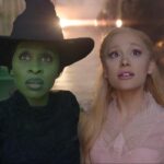 Cynthia Erivo as the green with Elphaba, and Ariana Grande as Galinda in frilly pink.