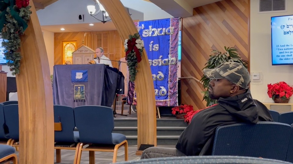 Kanye West at a religious service.