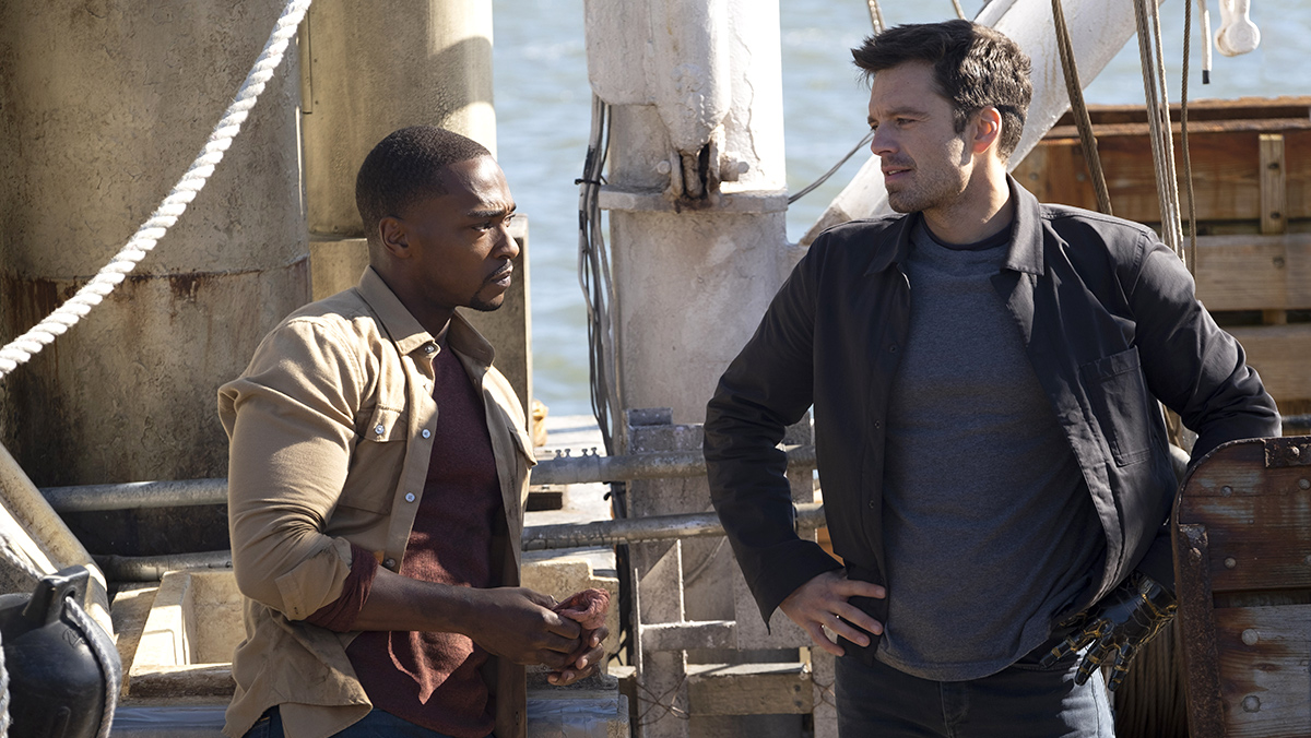 Sam Wilson and Bucky Barnes chat calmly on a boat in The Falcon and the Winter Soldier