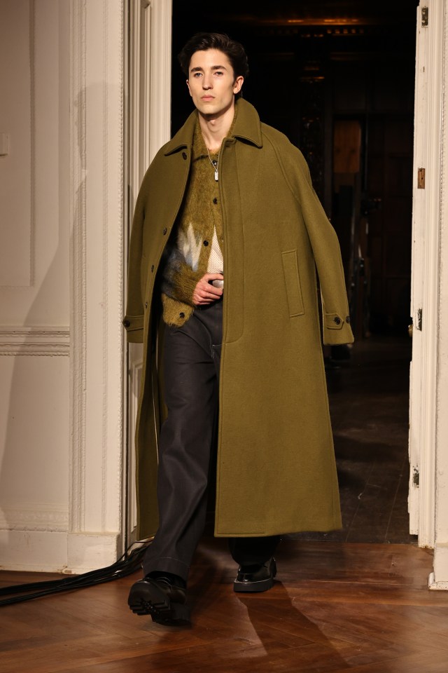 Model Holden Fraser walking the runway at New York Fashion Week.