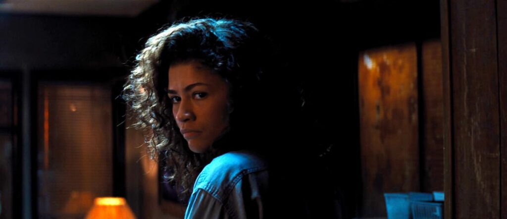 Zendaya looks over her shoulder in "Euphoria."