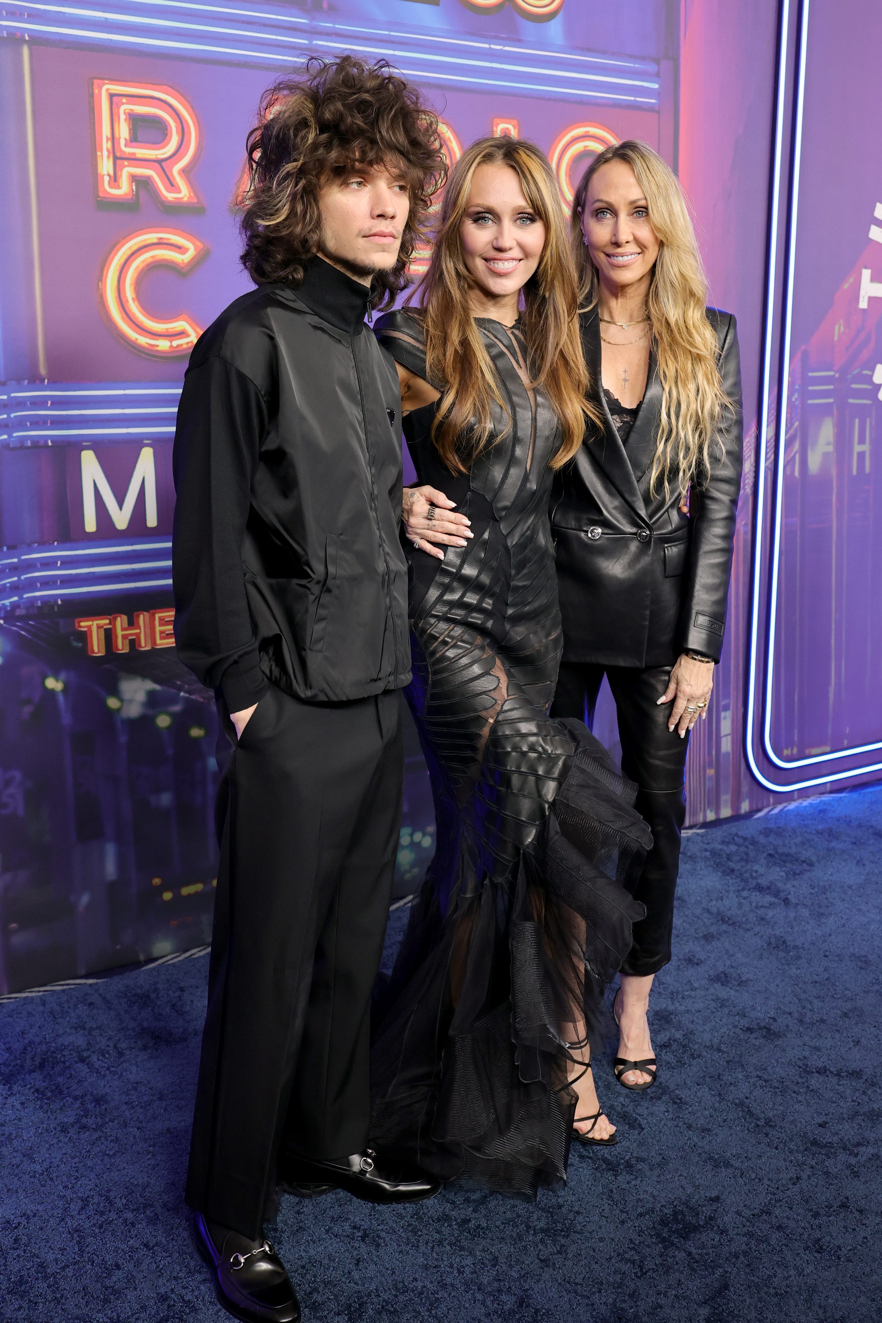 Maxx Morando, Miley Cyrus and Tish Cyrus attend SNL50: The Homecoming Concert at Radio City Music Hall