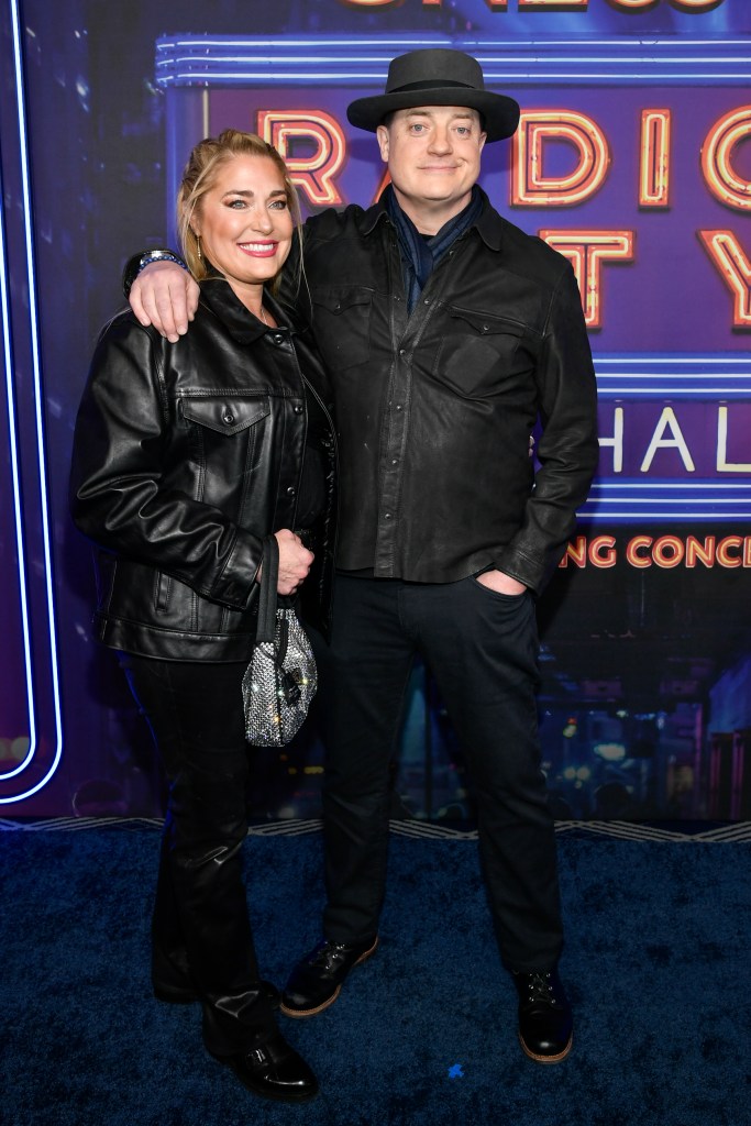 Afton Smith, left, and Brendan Fraser attend the SNL50: The Homecoming Concert at Radio City Music Hall 