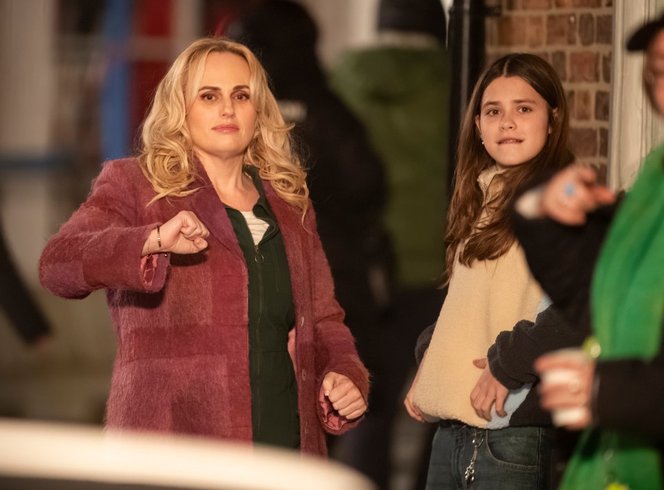 Rebel Wilson and a young girl on the set of a film.