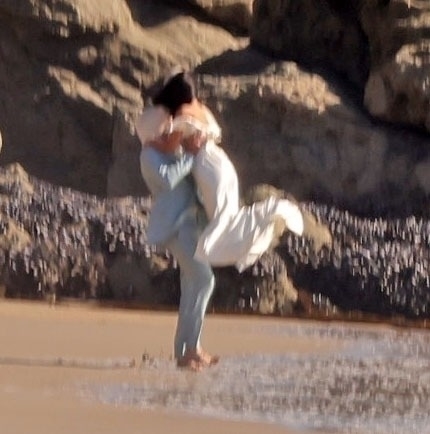 Kim Kardashian and Matthew Noszka on a beach wedding set.