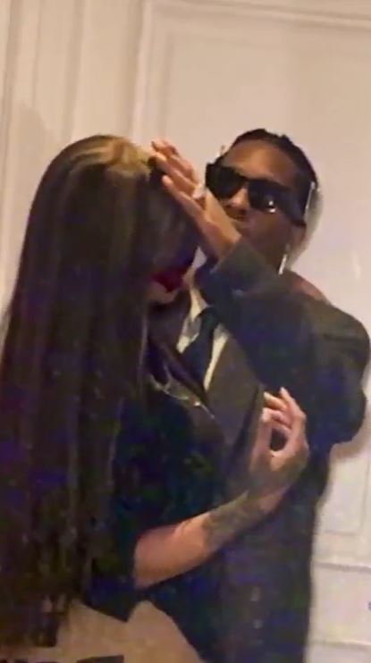 Rihanna and A$AP Rocky in an embrace.