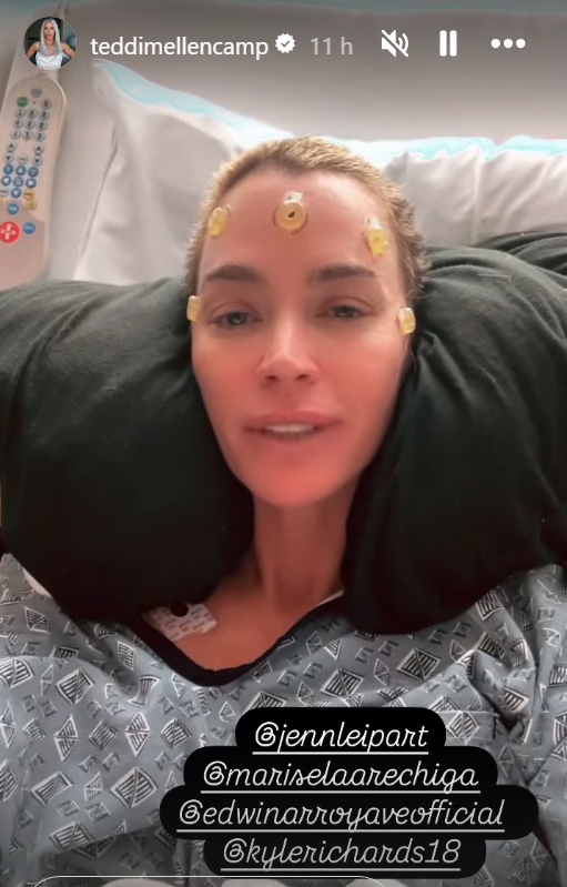 Teddi Mellencamp in a hospital bed with sensors on her forehead.