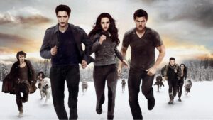 A promo image from Twilight Breaking Dawn Part 2 shows Edward, Bella, and Jacob running towards the camera followed by other vampires