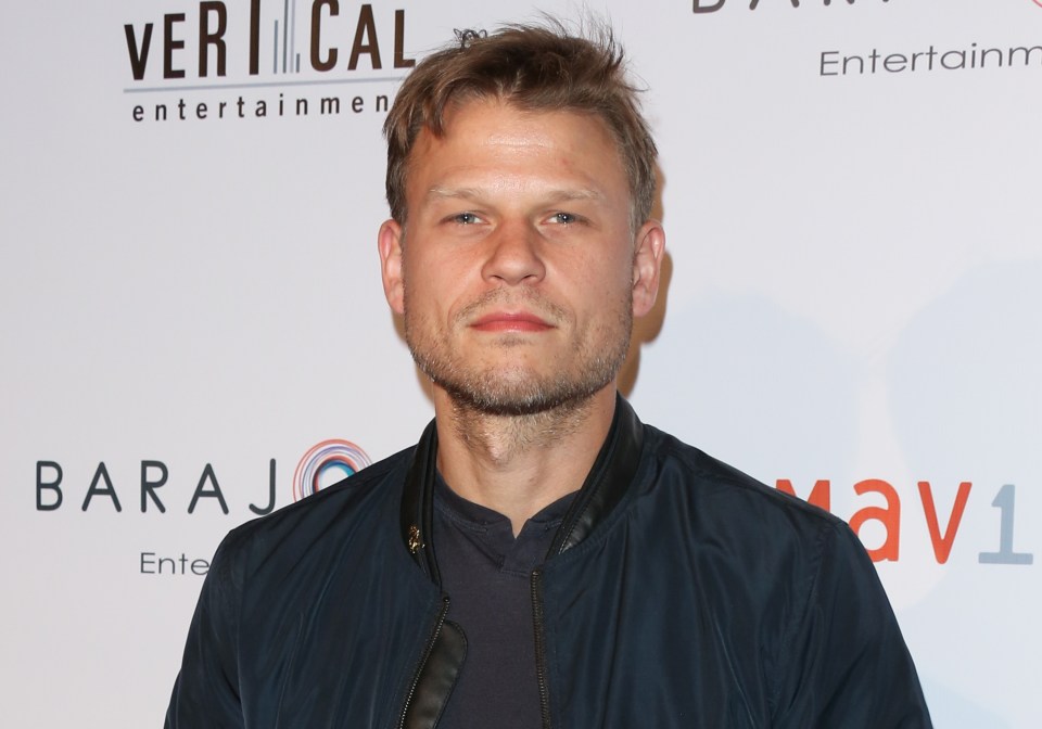 Headshot of actor Aaron Schwartz at a film premiere.