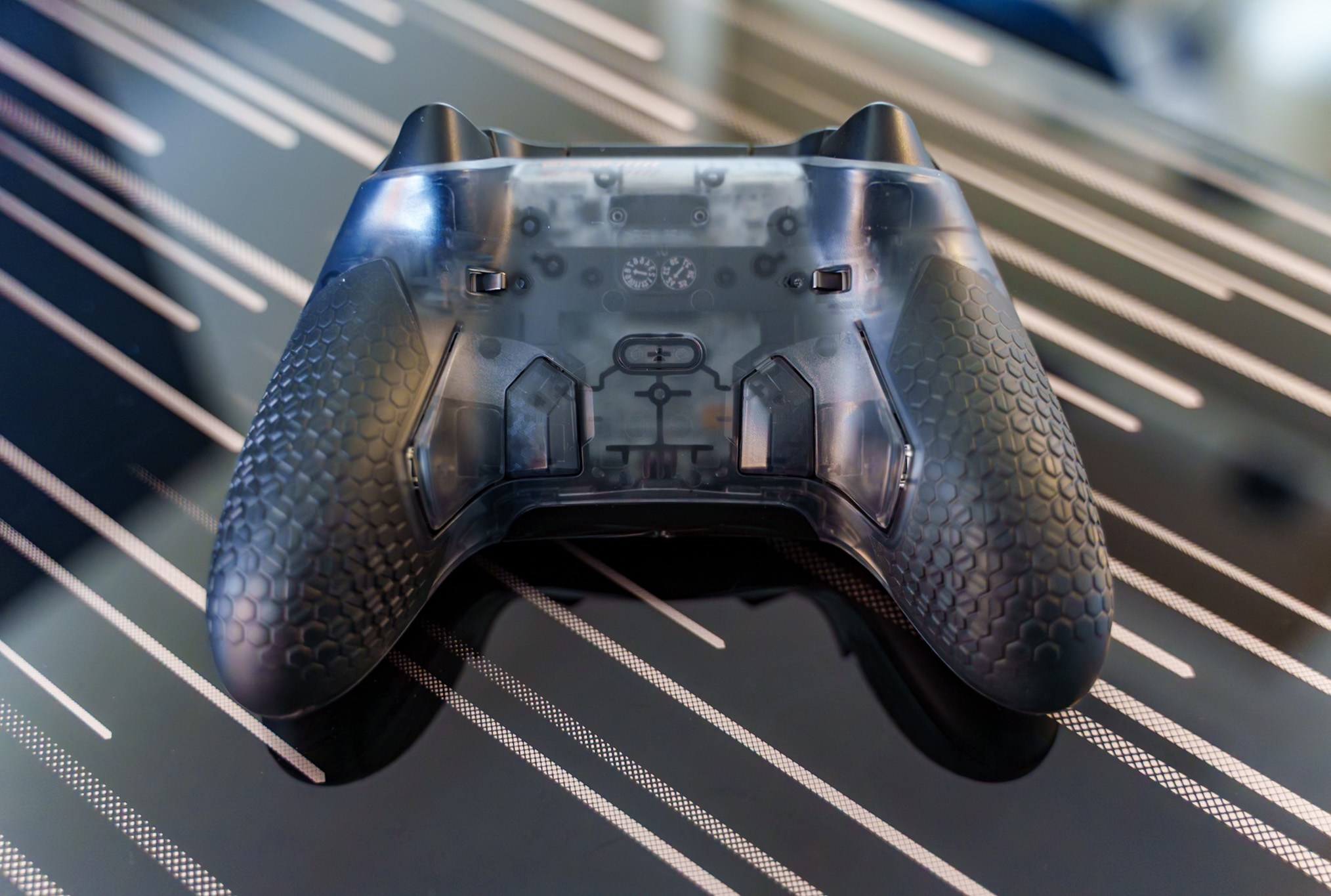 Photo of scuf valor pro xbox controller on glassy desk