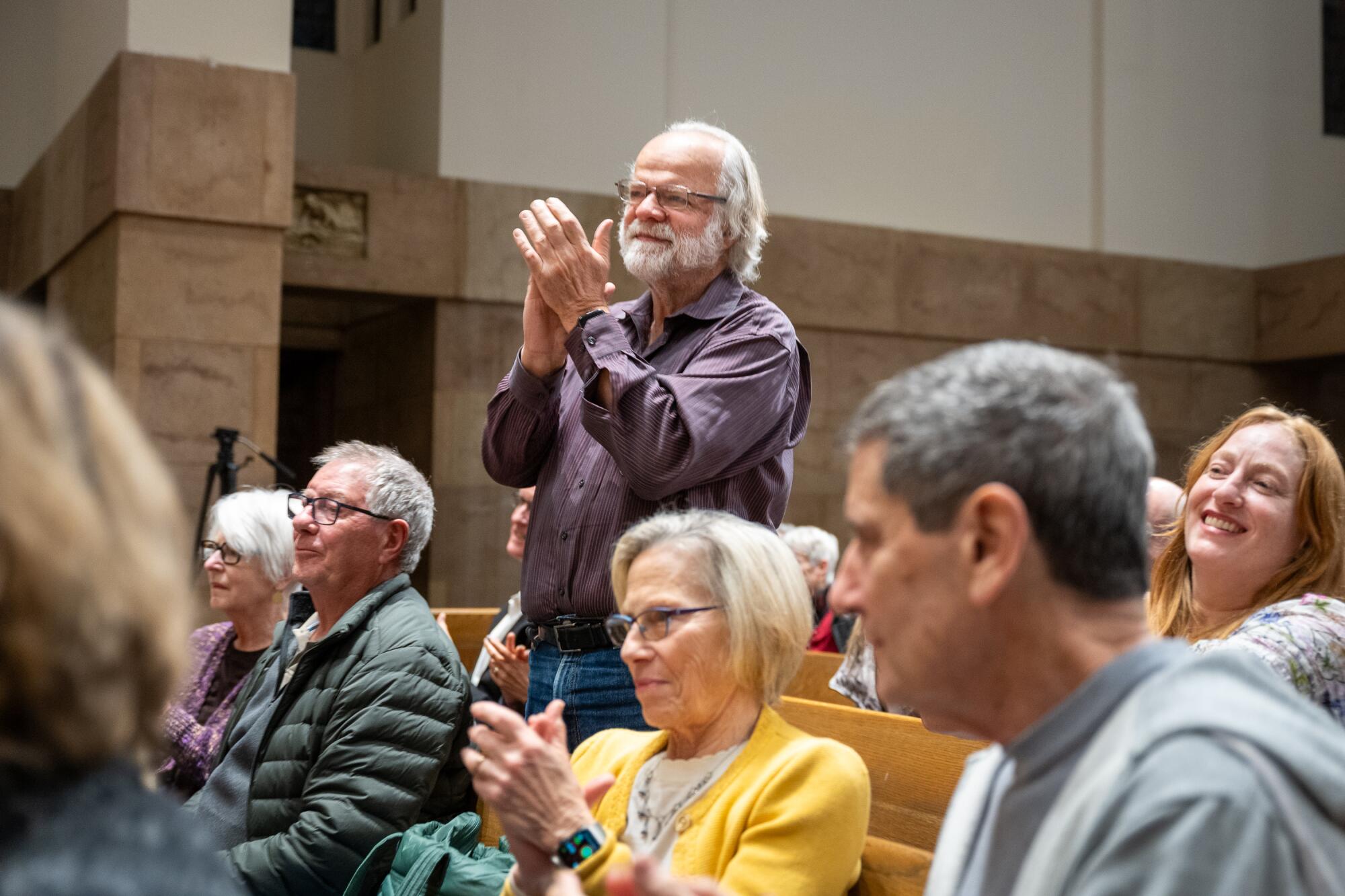 Attendees applaud the Palisades Symphony performance at the Westwood United Methodist Church.