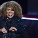 A smiling Roberta Flack wears dark sequins