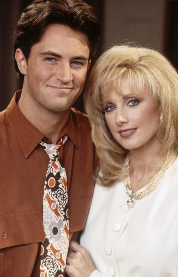 Matthew Perry as Chandler Bing and Morgan Fairchild as Nora Tyler Bing in Friends.