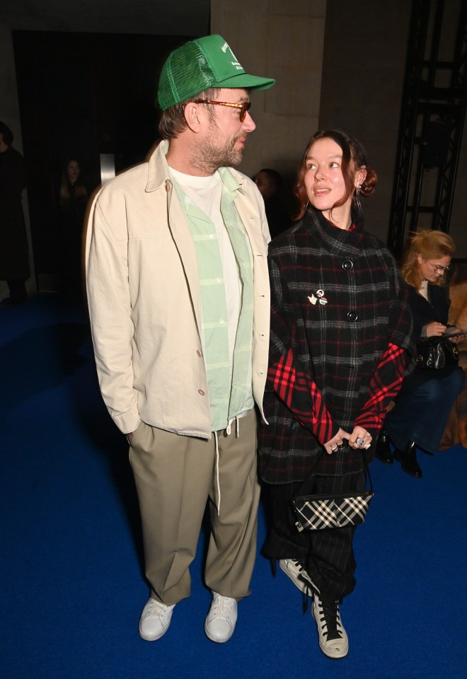 Damon and Missy Albarn at a fashion show.