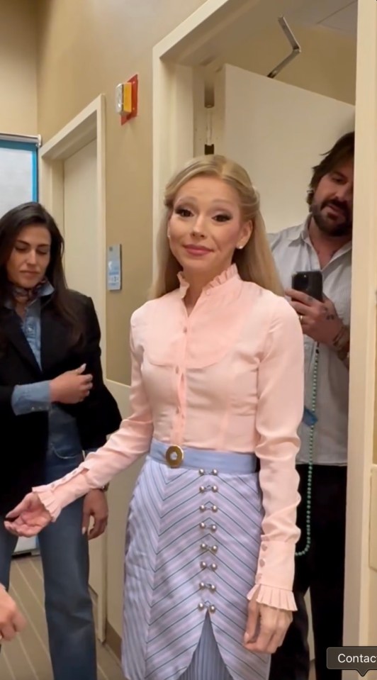 Kelly Ripa in Ariana Grande costume.